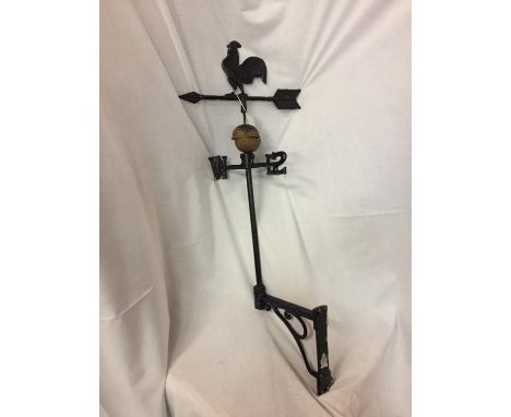 A CAST IRON WEATHER VANE WITH A COCKEREL FINIAL 
