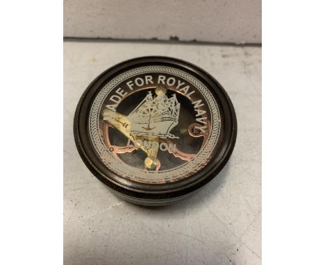 A SUNDIAL COMPASS 