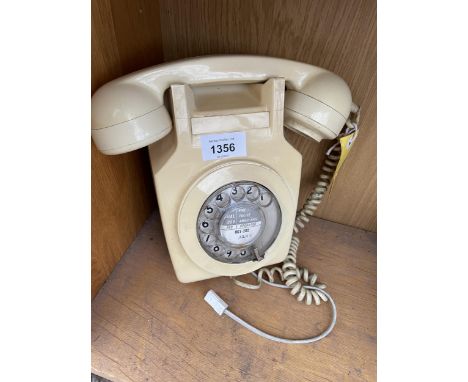 A RETRO CREAM ROTARY DIAL WALL MOUNTED TELEPHONE 