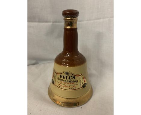 A BELL'S OLD SCOTCH WHISKY 70% PROOF 37.8CL IN A WADE BELL COLLECTABLE BOTTLE 