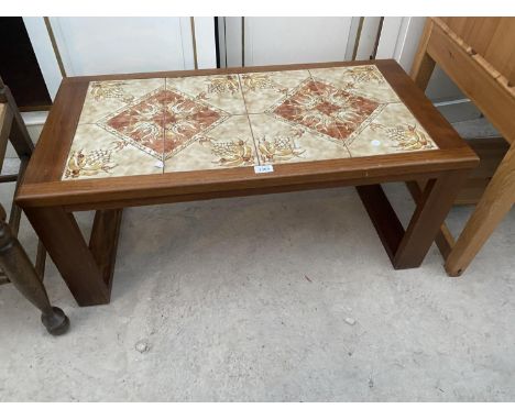 A RETRO TEAK TILE TOP COFFEE TABLE 38 INCHES X 19 INCHES 