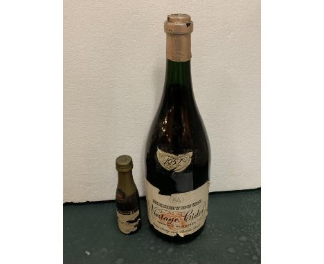 A BOTTLE OF 1954 MERRYDOWN VINTAGE CIDAR AND A BOTTLE OF BABY MOUSSEC 