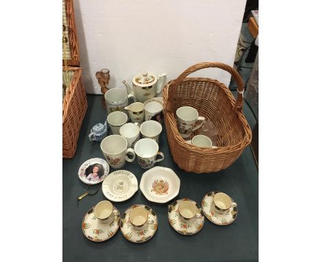 A BASKET OF POTTERY ITEMS TO INCLUDE FOUR MINTONS CUPS AND SAUCERS, COMMEMORATIVE CUPS, MUGS AND PLATES, MINTONS TEAPOT, CREA