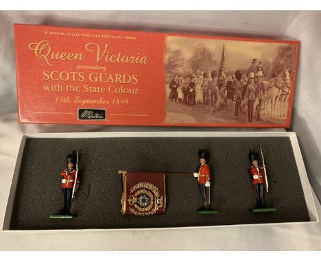 A BOXED BRITAINS SCOTS GUARDS WITH THE STATE COLOUR THREE PIECE MODEL SOLDIER SET - NUMBER 5991 