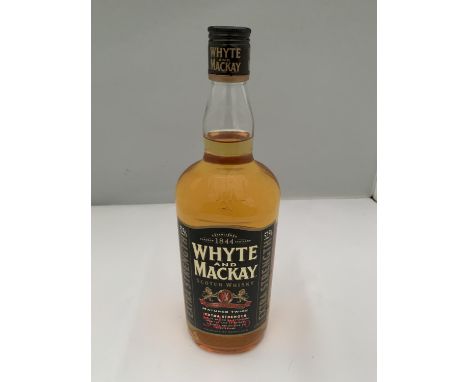 A 1 LITRE BOTTLE OF WHYTE AND MACKAY SCOTCH WHISKY MATURED TWICE EXTRA STRENGTH 52.5% VOLUME 