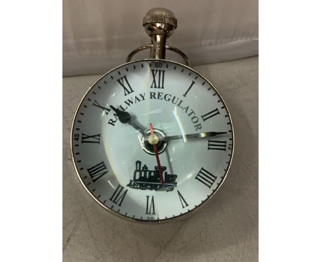 A CHROME RAILWAYS BUBBLE CLOCK 