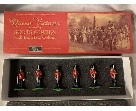 A BOXED BRITAINS SCOTS GUARDS SIX PIECE MODEL SOLDIER SET -  NUMBER 00294 - FROM THE QUEEN VICTORIA PRESENTING THE STATE COLO