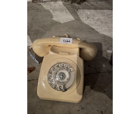 A RETRO CREAM ROTARY DIAL TELEPHONE 