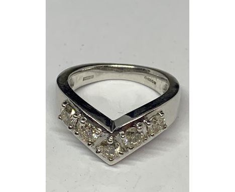 AN 18 CARAT WHITE GOLD RING IN A WISHBONE DESIGN WITH FIVE IN LINE DIAMONDS SIZE M/N 