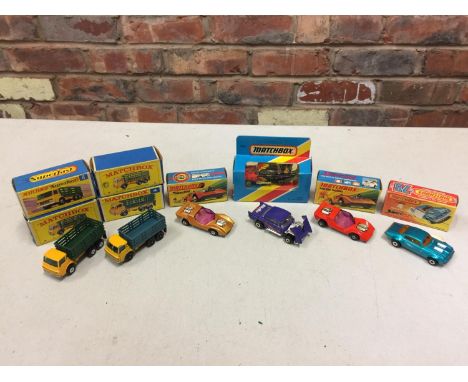 EIGHT BOXED AND ONE UNBOXED MATCHBOX VEHICLES - ALL MODEL NUMBER 4 OF VARIOUS ERAS AND COLOURS - INCLUDING STAKE TRUCK, GRUES