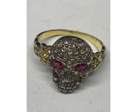 A MEMENTO MORI DIAMOND AND RUBY RING GROSS WEIGHT 3.9 GRAMS SIZE O/P WITH A PRESENTATION BOX 