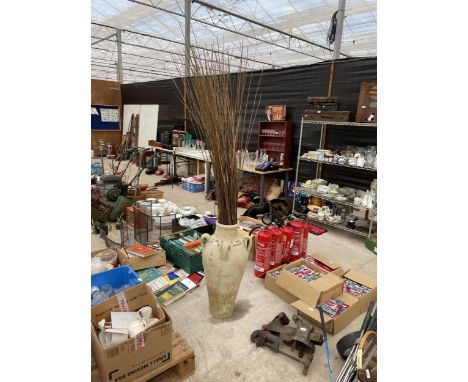 A LARGE CERAMIC URN VASE WITH A QUANTITY OF WILLOW STICKS 