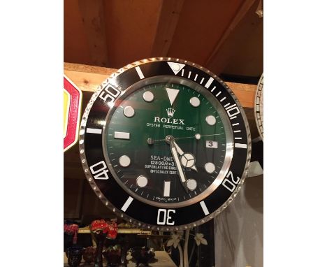 A ROLEX DEALERS WALL CLOCK 