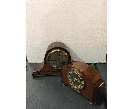 TWO VINTAGE MANTLE CLOCKS ONE BEING A NAPOLEONS HAT STYLE, THE OTHER HAS A PLAQUE FROM I C I DATED 1946 