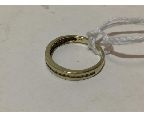 A 9 CARAT GOLD RING WITH CLEAR STONES GROSS WEIGHT 2 GRAMS 