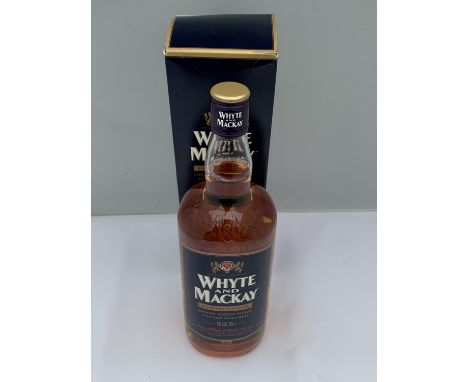 A BOXED 1 LITRE WHYTE AND MACKAY BLENDERS STRENGTH SMOOTH SCOTCH WHISKY DOUBLE MATURED BOTTLED AT 52.5% VOLUME 