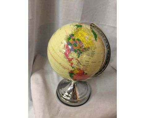 A LIGHT UP GLOBE, WORKING AT TIME OF LOTTING BUT NO WARRANTY 