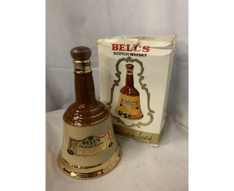 A BOXED BELL'S OLD SCOTCH WHISKY IN A WADE DECANTER 70% PROOF 75.7CL 