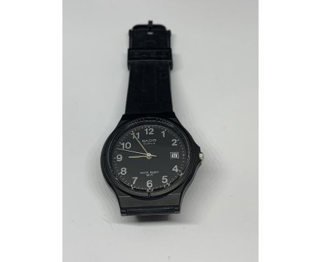 A CASIO WRIST WATCH SEEN WORKING BUT NO WARRANTY 