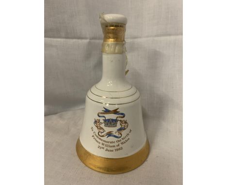 A BELL'S SCOTCH WHISKY, PERTH SCOTLAND, 40% VOL 50CL IN A COLLECTABLE WADE COMMEMORATIVE PORCELAIN DECANTER TO COMMEMORATE TH