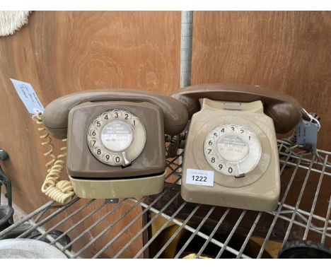 A RETRO GREY ROTARY DIAL TELEPHONE AND A FURTHE RETRO DIAL TELEPHONE 