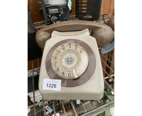 A RETRO GREY AND BROWN ROTARY DIAL TELEPHONE 