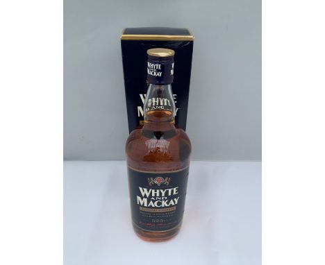 A BOXED 1 LITRE WHYTE AND MACKAY BLENDERS STRENGTH SMOOTH SCOTCH WHISKY DOUBLE MATURED BOTTLED AT 52.5% VOLUME 