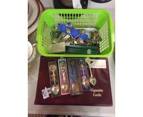 AN ALBUM OF VINTAGE PHOTOGRAPHS, AND A QUANTITY OF COLLECTABLE SPOONS 