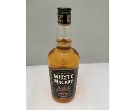 A 1 LITRE BOTTLE OF WHYTE AND MACKAY SCOTCH WHISKY MATURED TWICE EXTRA STRENGTH 52.5% VOLUME 