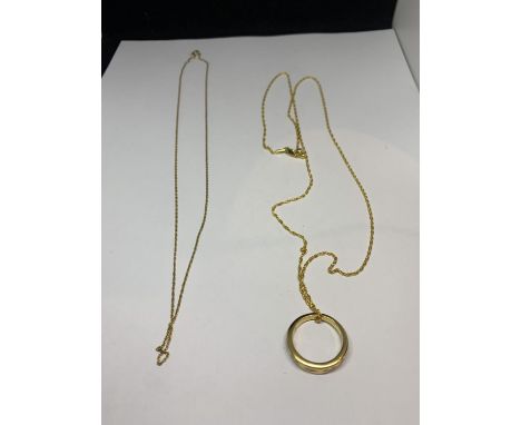 A SILVER GILT CHAIN WITH A RING AND A FURTHER YELLOW METAL CHAIN 