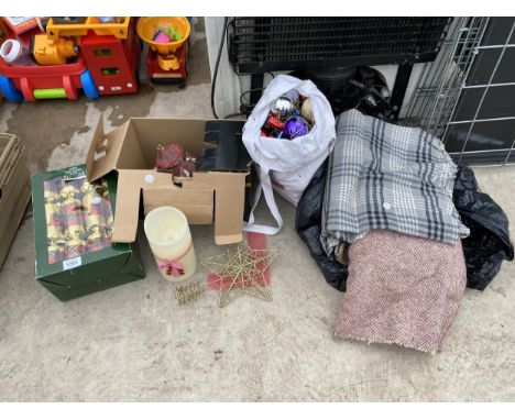 AN ASSORTMENT OF CHRISTMAS ITEMS TO INCLUDE CRACKERS, BAUBLES AND A LIGHT UP HOUSE ETC 