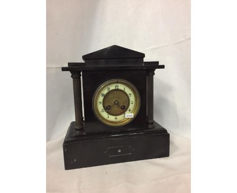 A HEAVY VINTAGE SLATE MANTLE CLOCK, HEIGHT 29CM, WIDTH 26.5 CM 