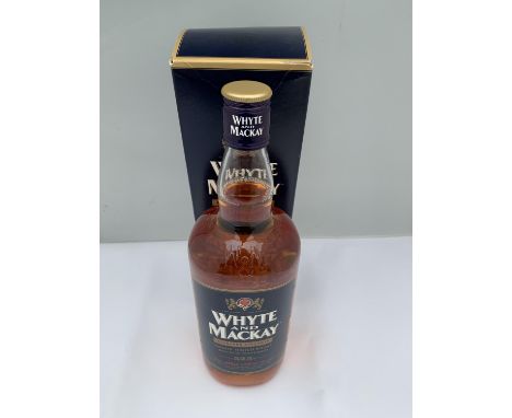 A BOXED 1 LITRE WHYTE AND MACKAY BLENDERS STRENGTH SMOOTH SCOTCH WHISKY DOUBLE MATURED BOTTLED AT 52.5% VOLUME 