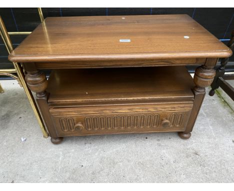 AN ERCOL ELM TV/VIDEO TABLE WITH SINGLE DRAWER AND TRIANGULAR BACK DROP-LEAF, 29" WIDE 