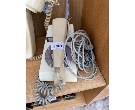 A RETRO CREAM ROTARY DIAL TELEPHONE 