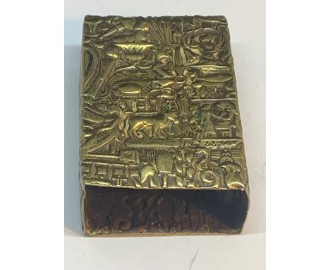 A VINTAGE ORNATE BRASS MATCHBOX HOLDER 