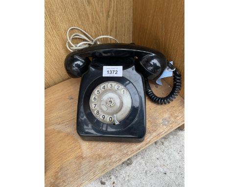 A RETRO BLACK ROTARY DIAL TELEPHONE 