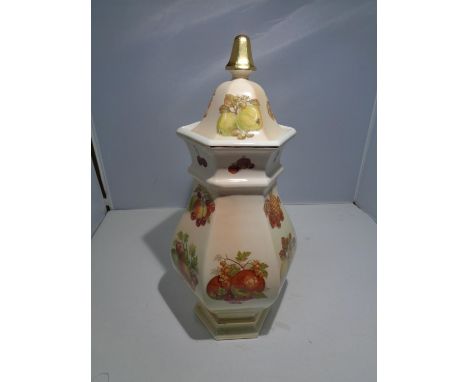 A PALISSY HEXAGONAL LIDDED VASE IN A FRUIT DESIGN 