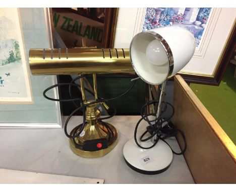 A WHITE AND CHROME ANGLE POISE STYLE LAMP AND A BRASS BANKERS STYLE LAMP 
