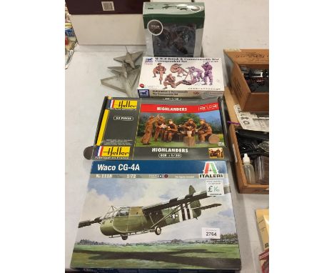 A DIECAST SPITFIRE, THREE MODEL RAF VULCANS , THREE MODEL KITS 