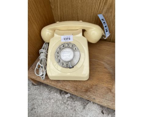 A RETRO CREAM ROTARY DIAL TELEPHONE 