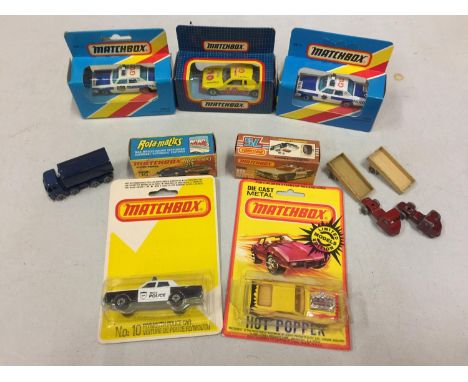 SEVEN BOXED AND THREE UNBOXED MATCHBOX VEHICLES - ALL MODEL NUMBER 10 OF VARIOUS ERAS AND COLOURS - INCLUDING US POLICE CAR, 