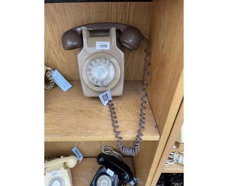 A RETRO BROWN ROTARY DIAL WALL MOUNTED TELEPHONE 
