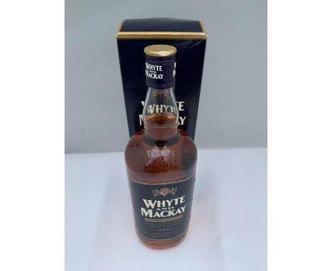 A BOXED 1 LITRE WHYTE AND MACKAY BLENDERS STRENGTH SMOOTH SCOTCH WHISKY DOUBLE MATURED BOTTLED AT 52.5% VOLUME 