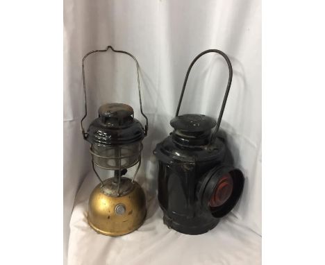 TWO VINTAGE OIL LAMPS TO INCLUDE THE ADLAKE NON SWEATING RAILWAY LANTERN AND A LARGE ORIGINAL TILLEY LAMP 