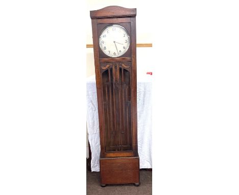 German Grandmother clock with weights and pendulum, approximate measurements: Height 75 inches, Width 17 inches, Depth 10.5 i