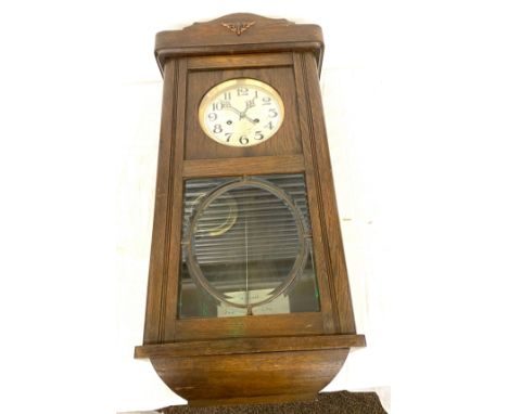 Edwardian oak wall clock,  with key and pendulum untested 