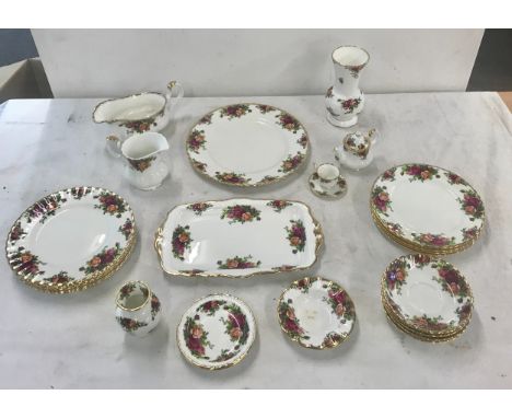 Royal Albert old country rose part dinner/ tea service  includes 2 vase, small tea pot, gravy boat, 10 side plates 1 large pl