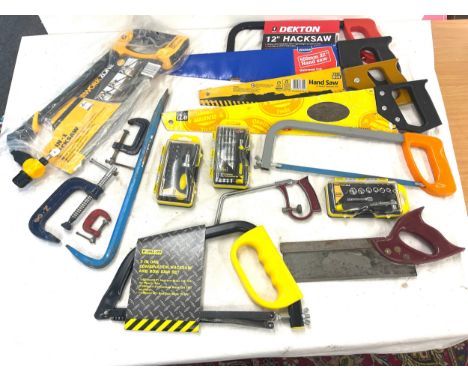 Selection of tools to include saws, drill pieces etc 