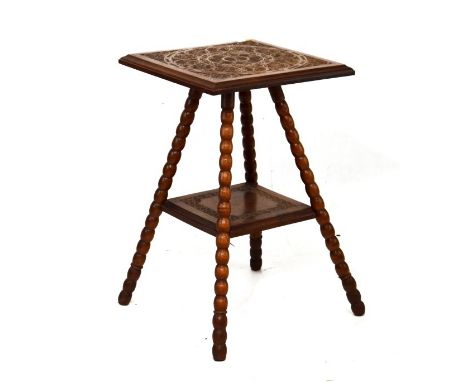 Early 20th Century carved oak square top two tier occasional table, standing on bobbin turned supports   Condition: 